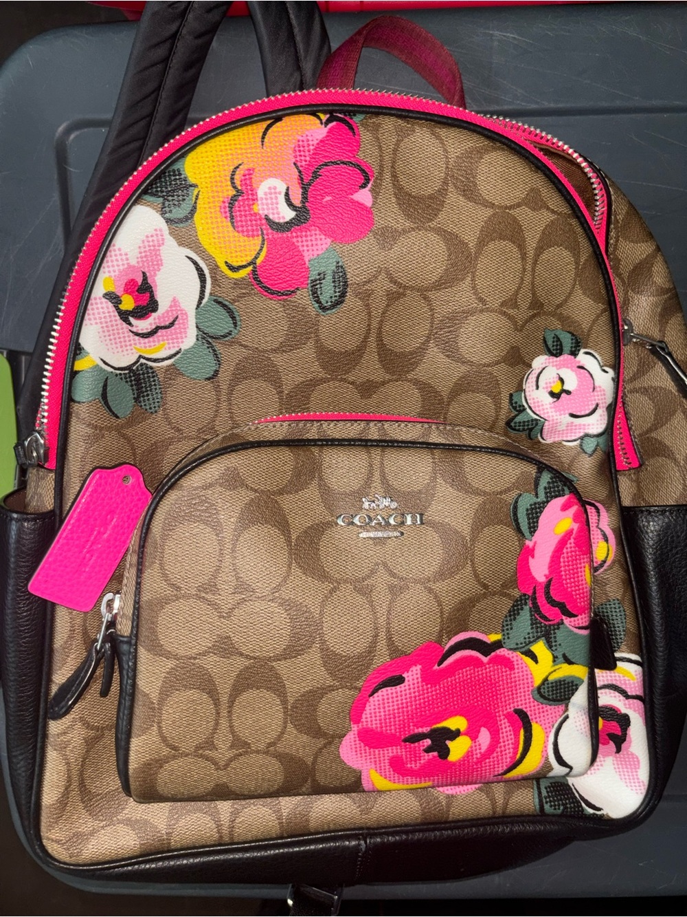 Coach Brown Signature Floral Backpack with Pink and Yellow Accents